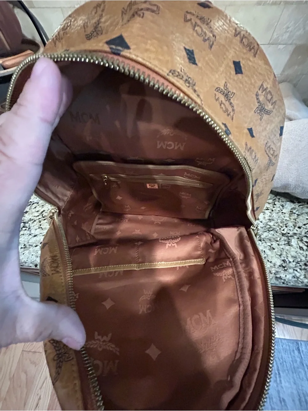 MCM Cognac Visetos Backpack Large with mcm bone bag charm and coa card.